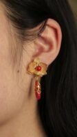 red and gold earring
