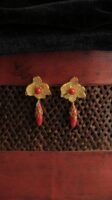 red and gold earring