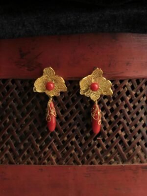 red and gold earring