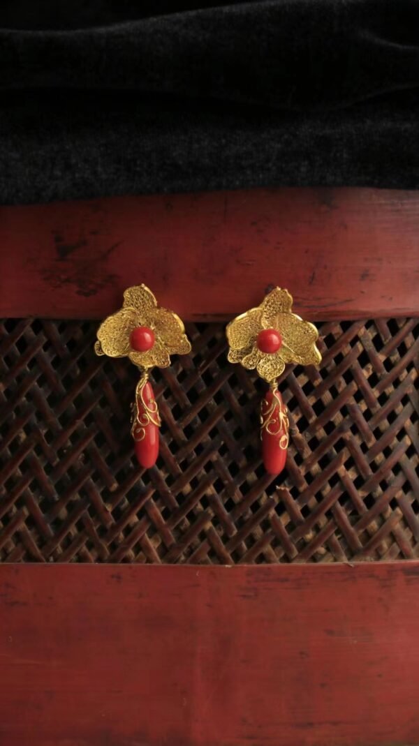red and gold earring